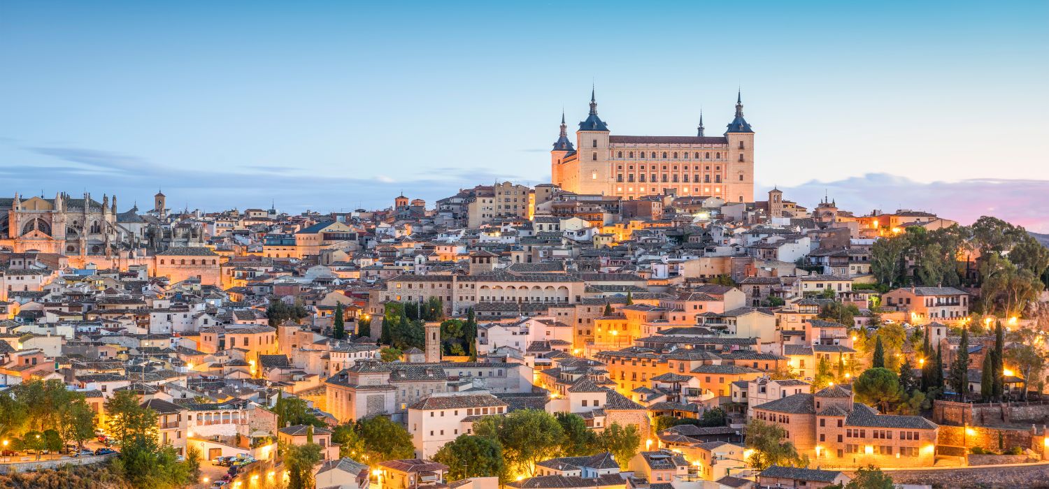 Toledo, Spain town skyline at the Alcazar at dawn.