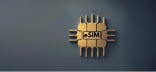 A gold colored microchip representing an eSIM card